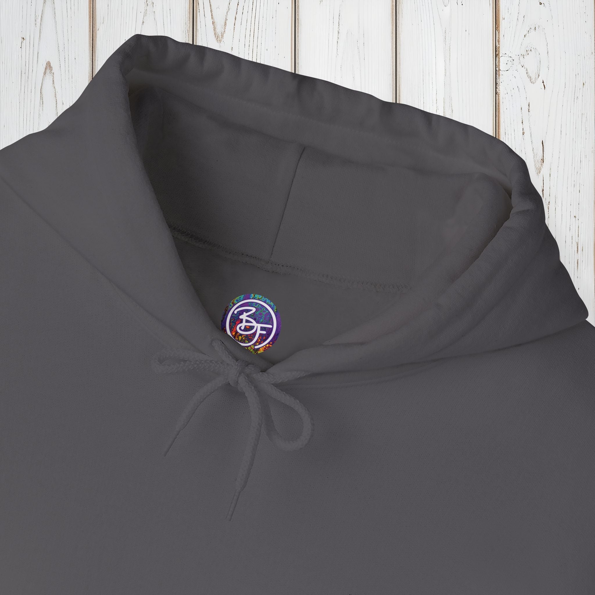 Bespattered Facade "Rainbow Is the New Black" Colorful Embroidered Unisex Heavy Blend™ Hooded Sweatshirt