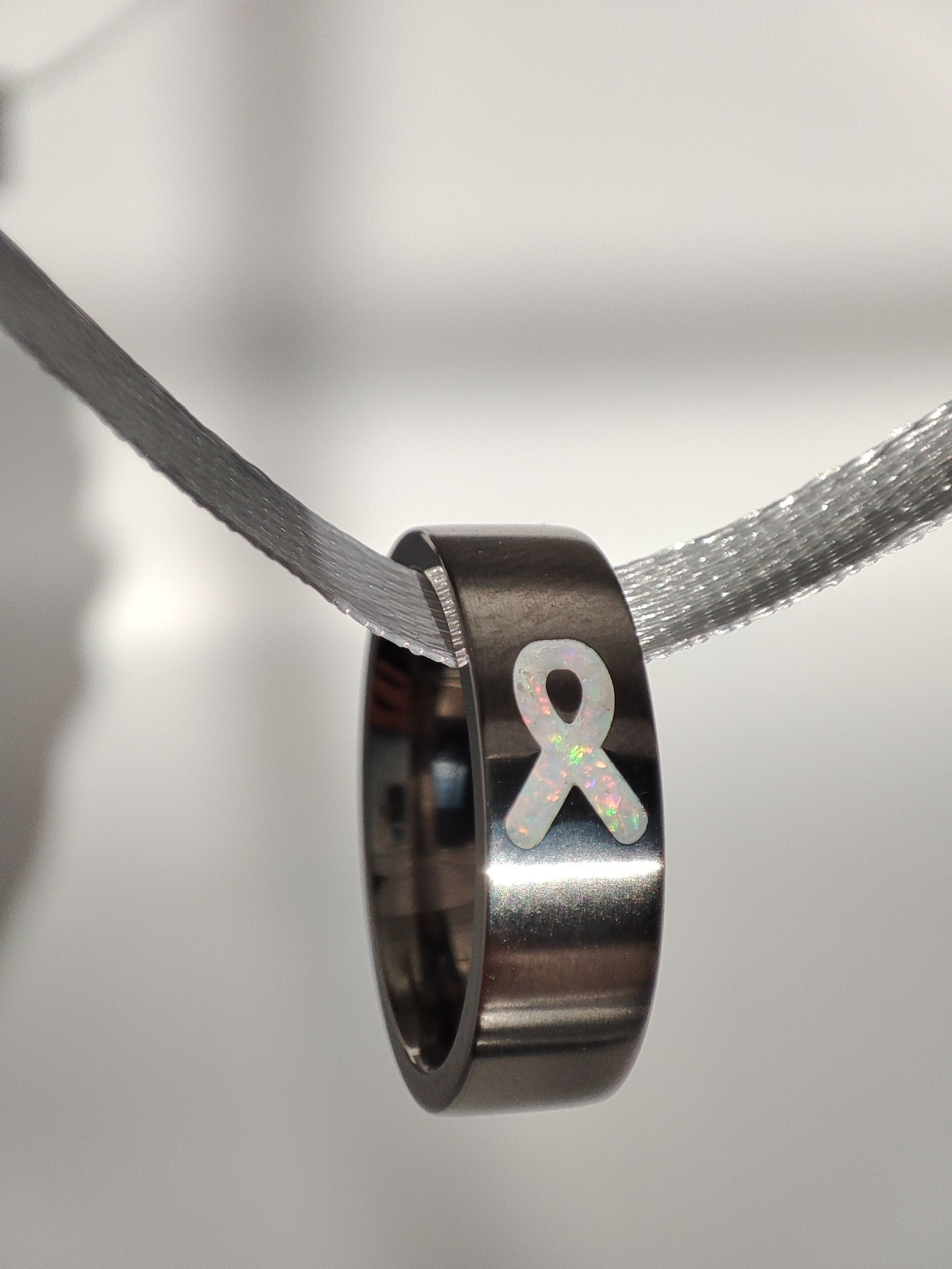 Resolve - White Awareness Ribbon - Titanium